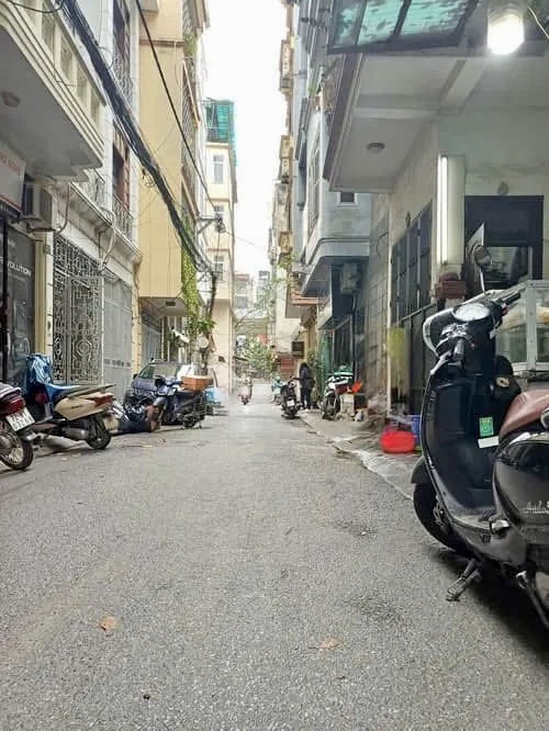 Nhà 5 Tầng 71m² MT 5.1m Thái Thịnh - Đống Đa, 4PN, Kinh Doanh Tốt, Ngõ Ô tô Tránh, 31.5 Tỷ